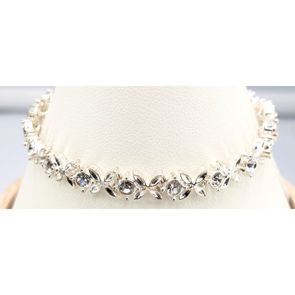 Signed Avon Floral Tennis Bracelet Silver Tone Clear Rhinestone Fold Clasp 7.5